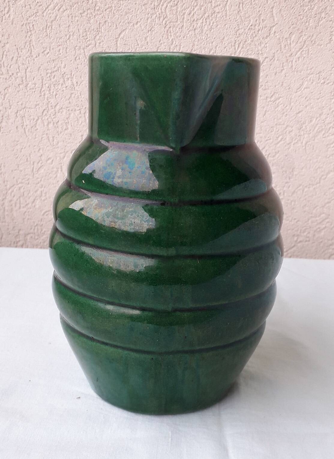 Green ceramic pitcher