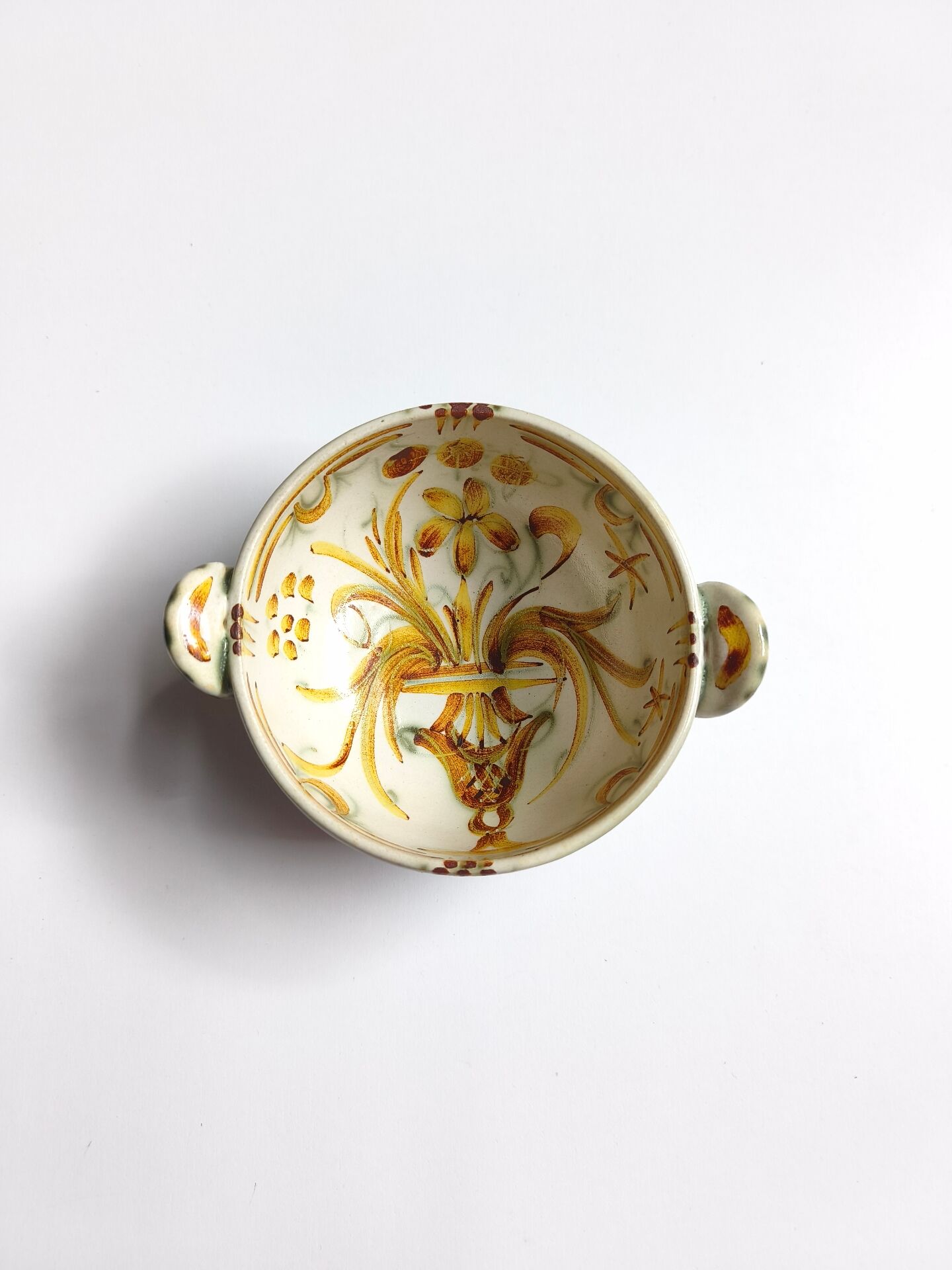 Vintage bowl signed Keraluc Quimper in yellow and green.