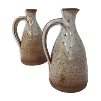 Duo of pitchers signed enamelled sandstone 1970