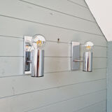 Pair of tubular wall sconces in chrome metal, 1970.