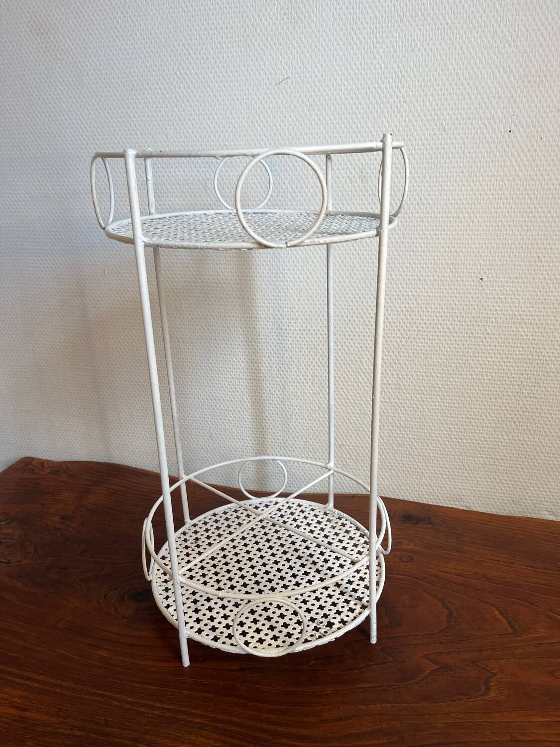 White perforated metal side table