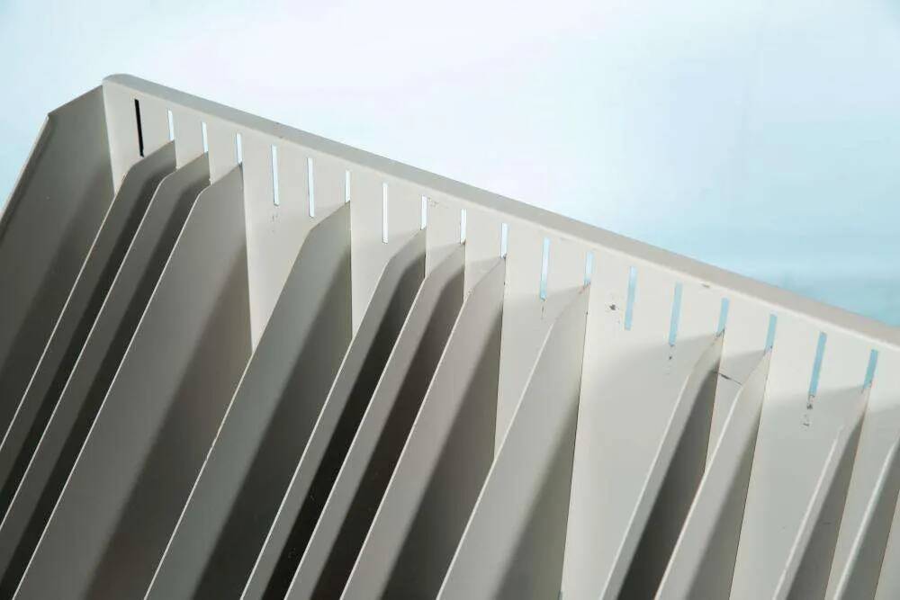 Vintage 1960s metal magazine rack, storage for single LPs.