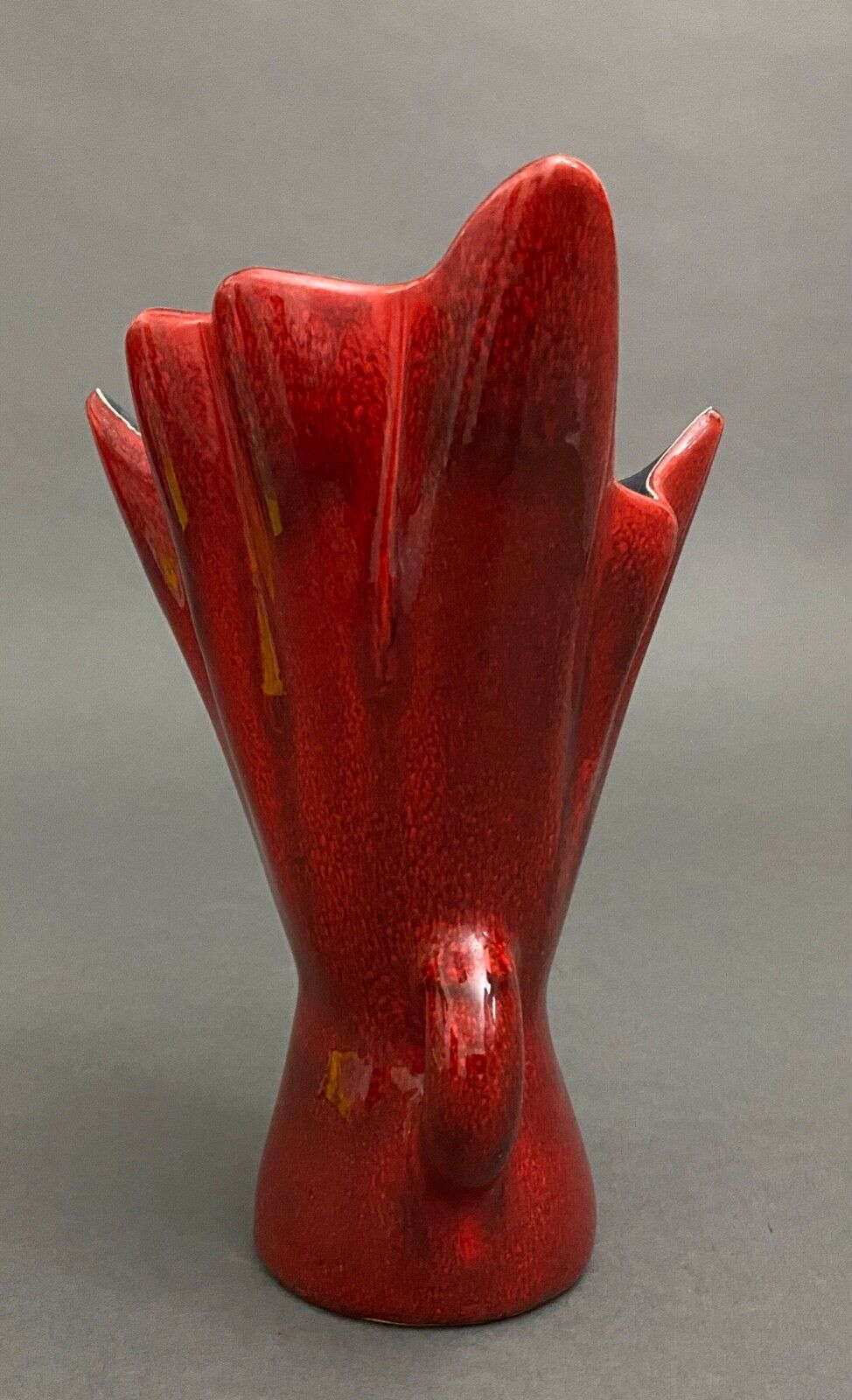 Free form red ceramic vase 1960 by J.L. or J.C.