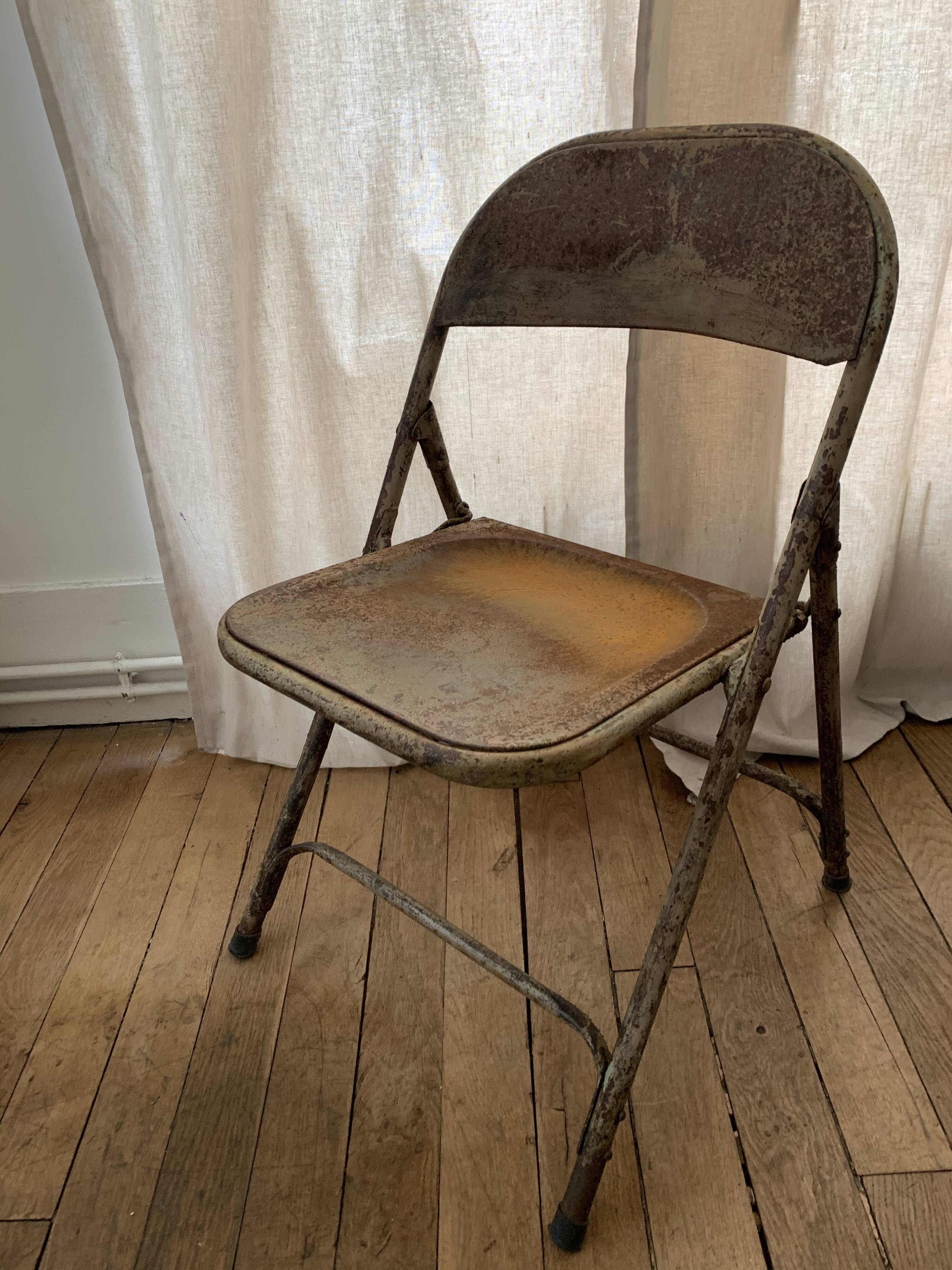 Lot of metal folding chairs