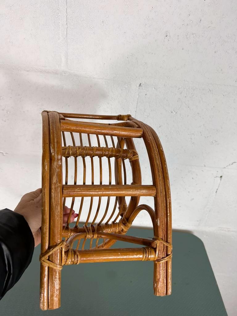 Vintage doll rocking chair in rattan