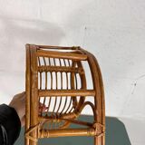 Vintage doll rocking chair in rattan