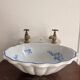 Wall-mounted washbasin shell-shaped, enamelled earthenware by Maurice Herb.