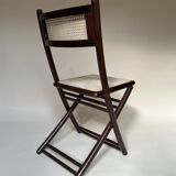 Set de quatre chaises pliantes en bois et cannage