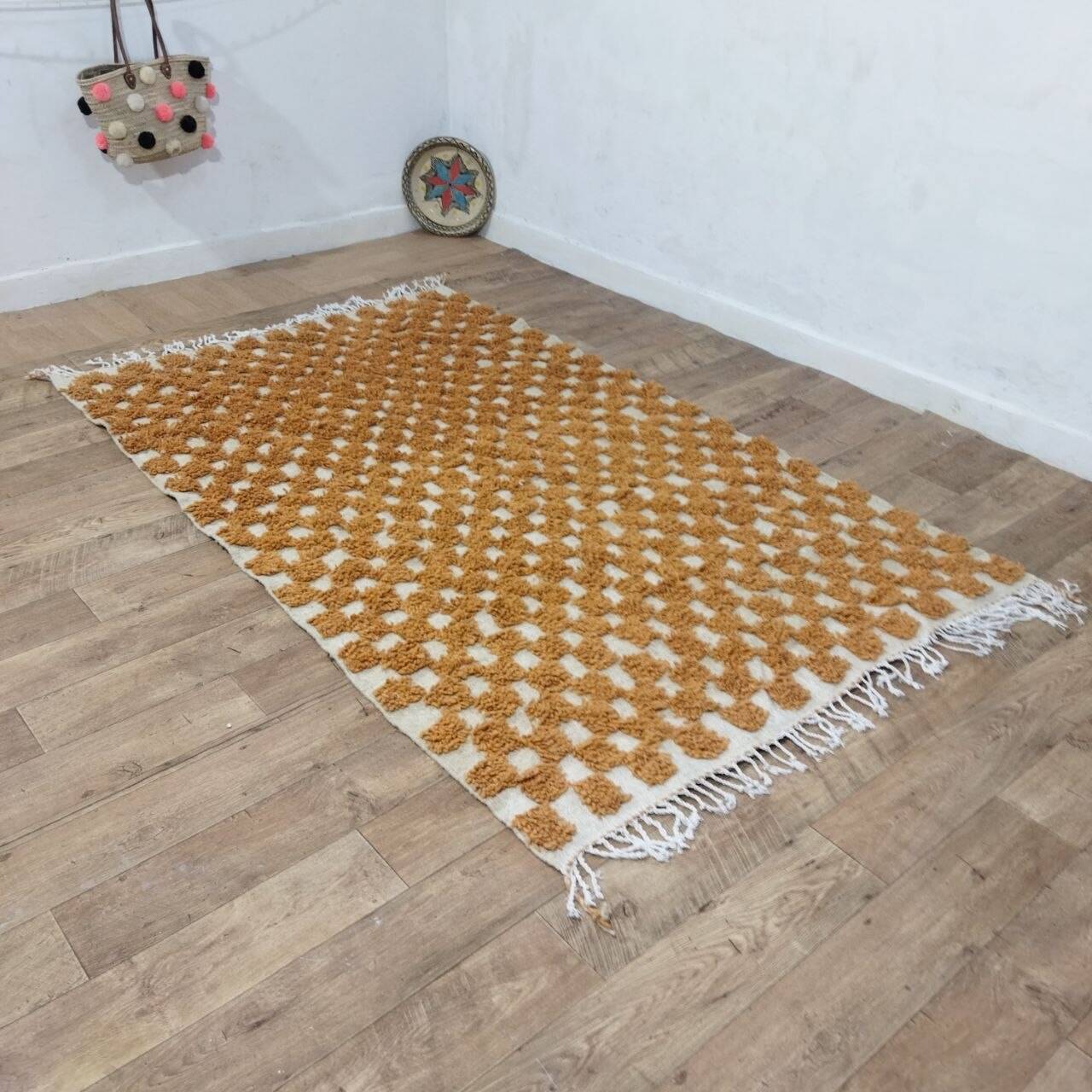 Moroccan Berber rug in ecru and camel wool with a graphic pattern, 245x150 cm.