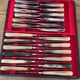 Service of 24 classic knives with natural bone handles - original case from 1950.
