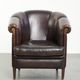 Dark sheepskin club armchair with unique design in English style