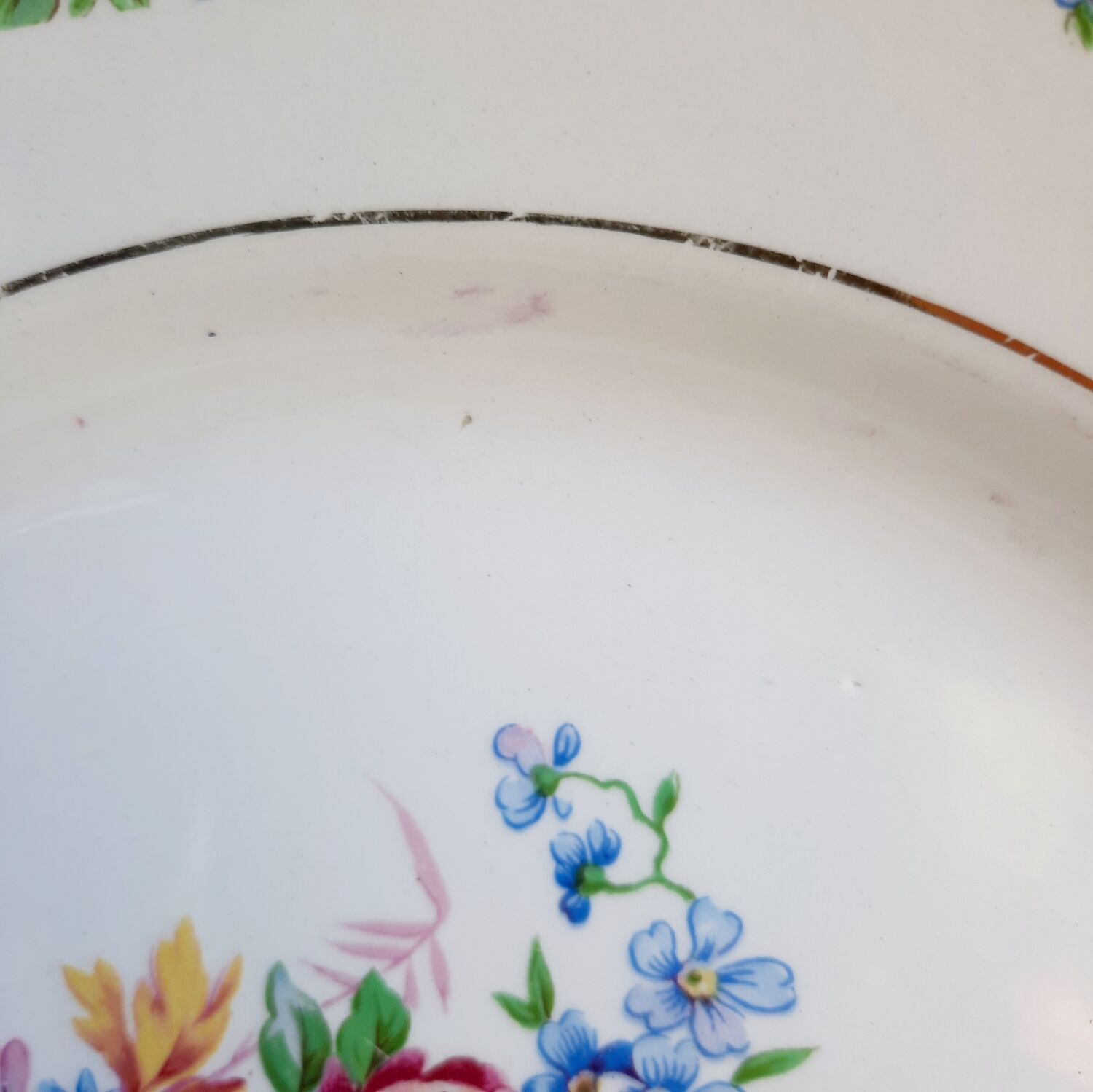 Old flat plates mismatched in earthenware