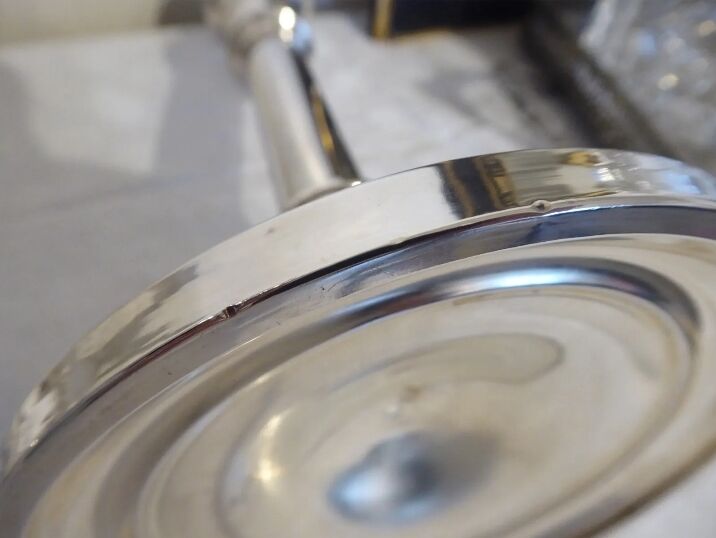 Pair of silver metal candle holders