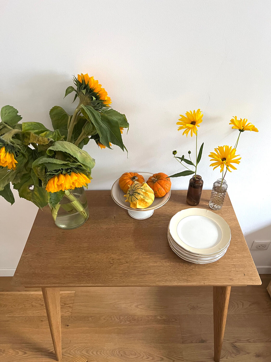 Side table with compass legs