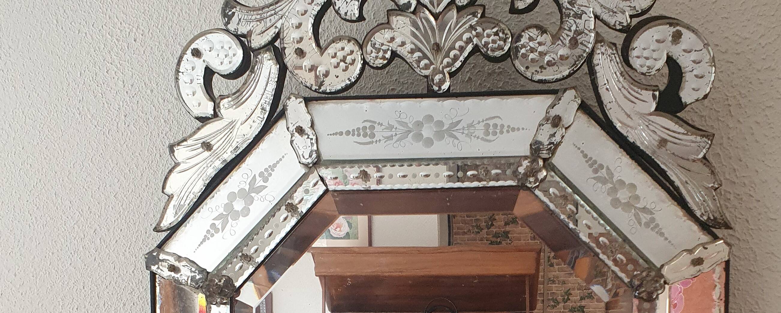 Antique Venetian mirror from the late 19th century – bevelled glass & engraved decoration – 124 x 68