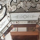 Antique Venetian mirror from the late 19th century – bevelled glass & engraved decoration – 124 x 68