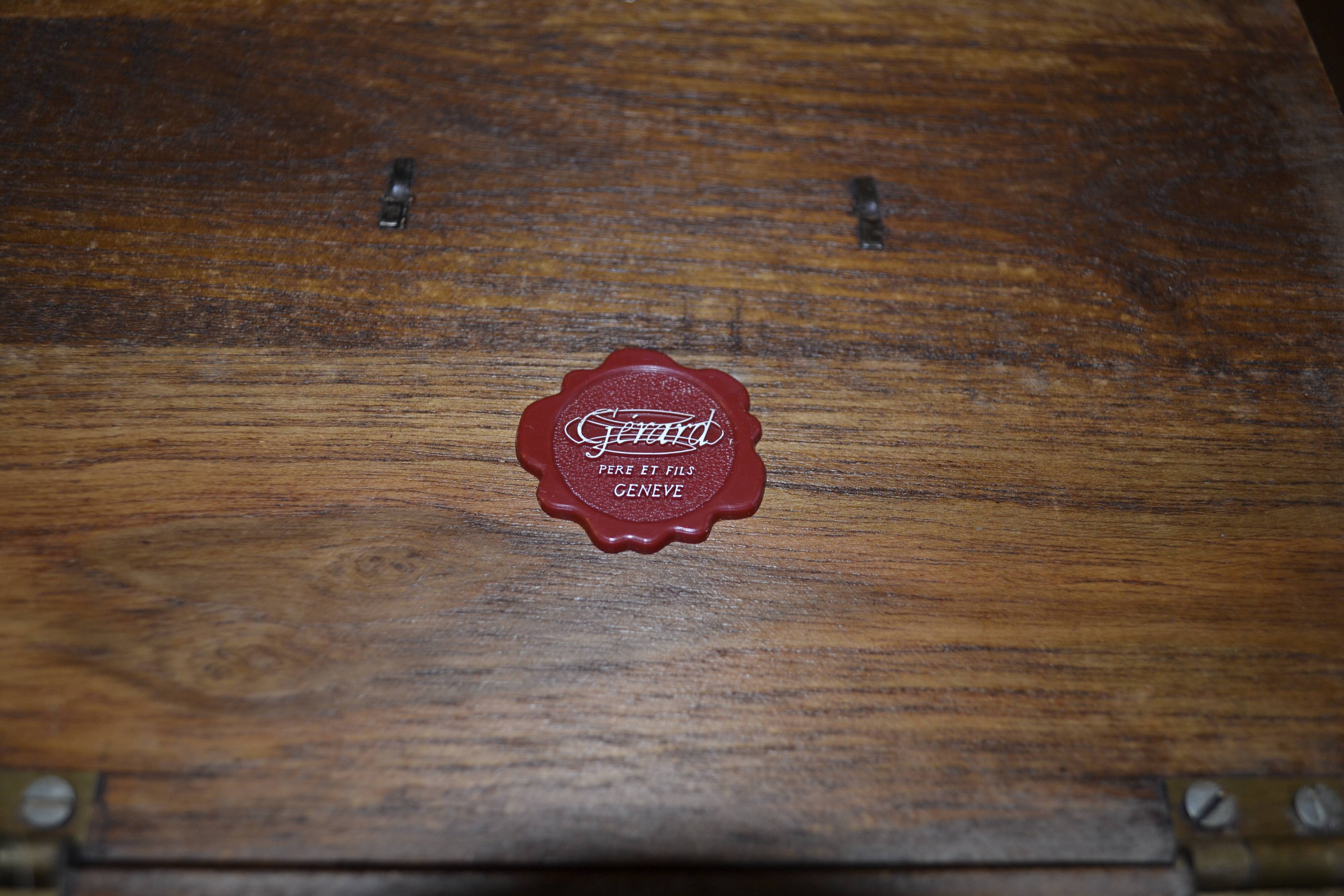 Wooden cigar box with accessory