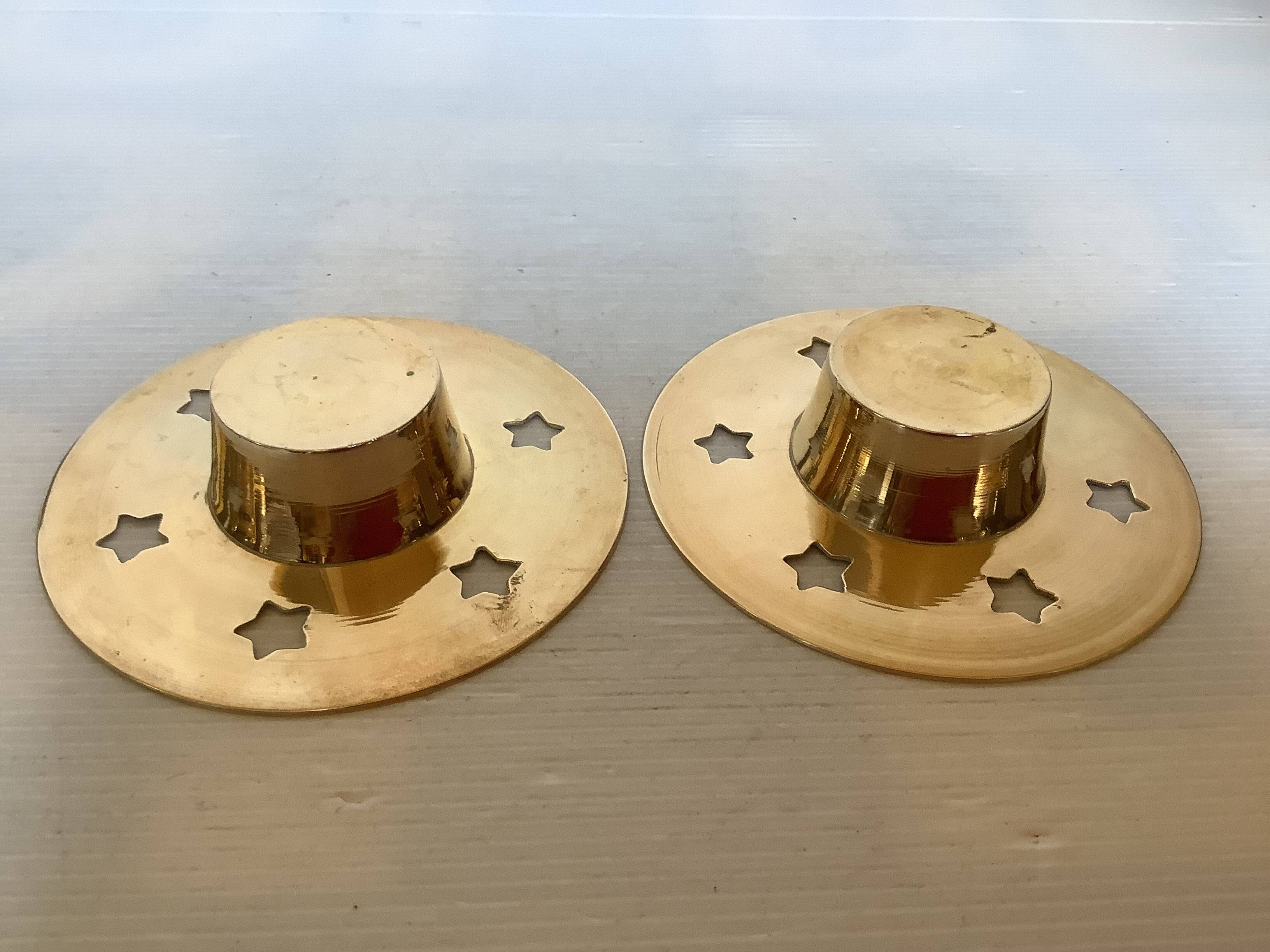 Pair of star candle holders in brass
