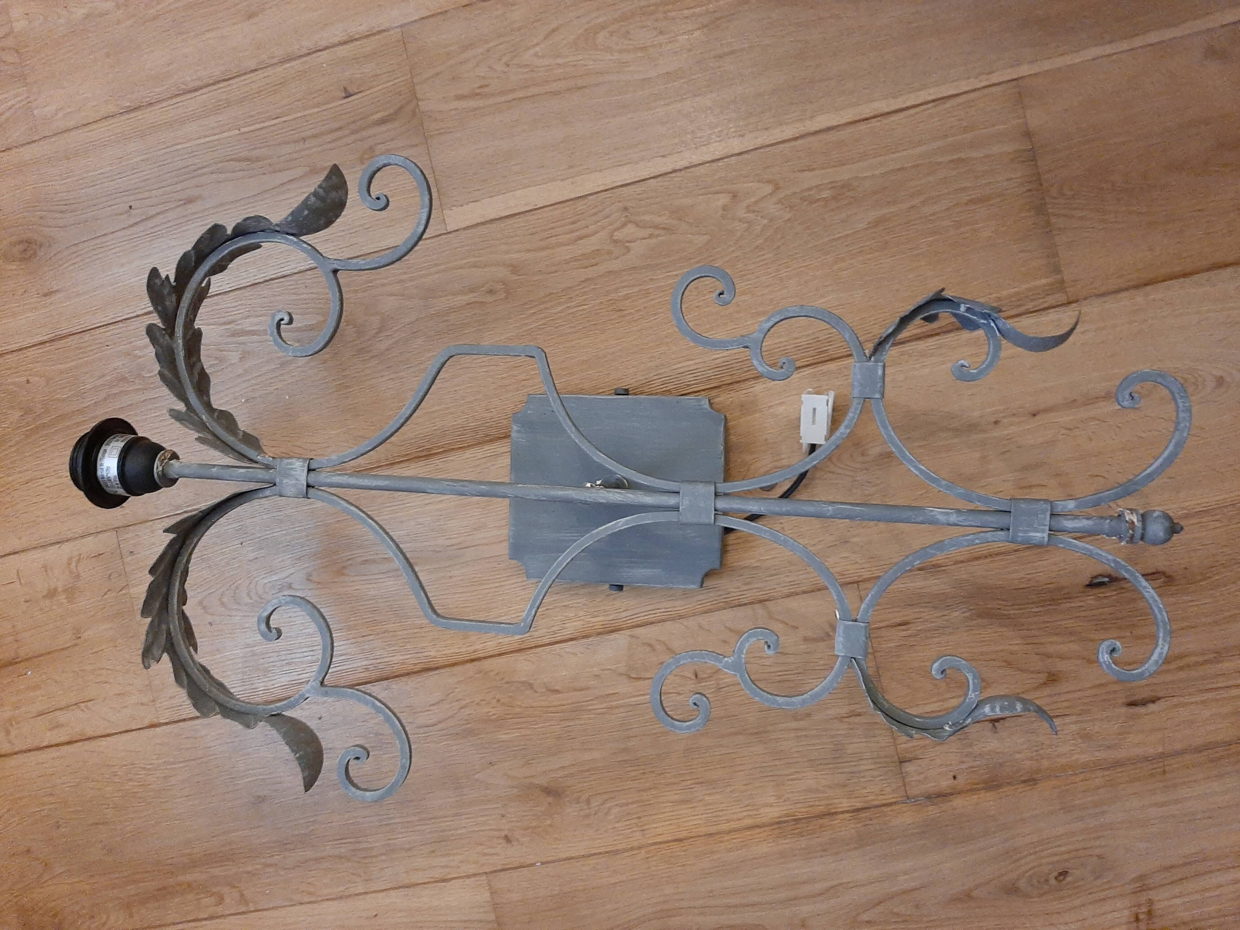 Forged iron wall light