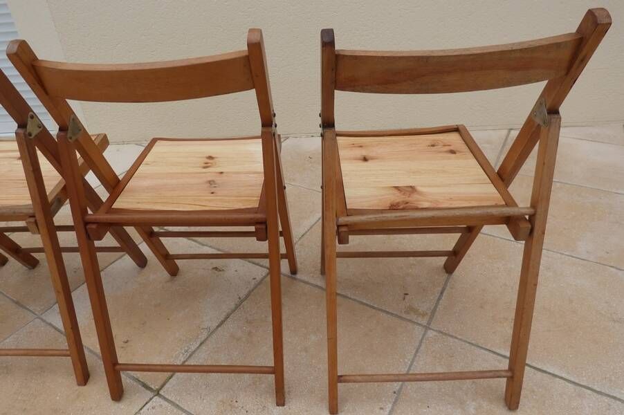 4 vintage varnished wooden folding chairs - Seats completely restored.
