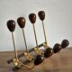 Coat rack varnished wood and gold metal