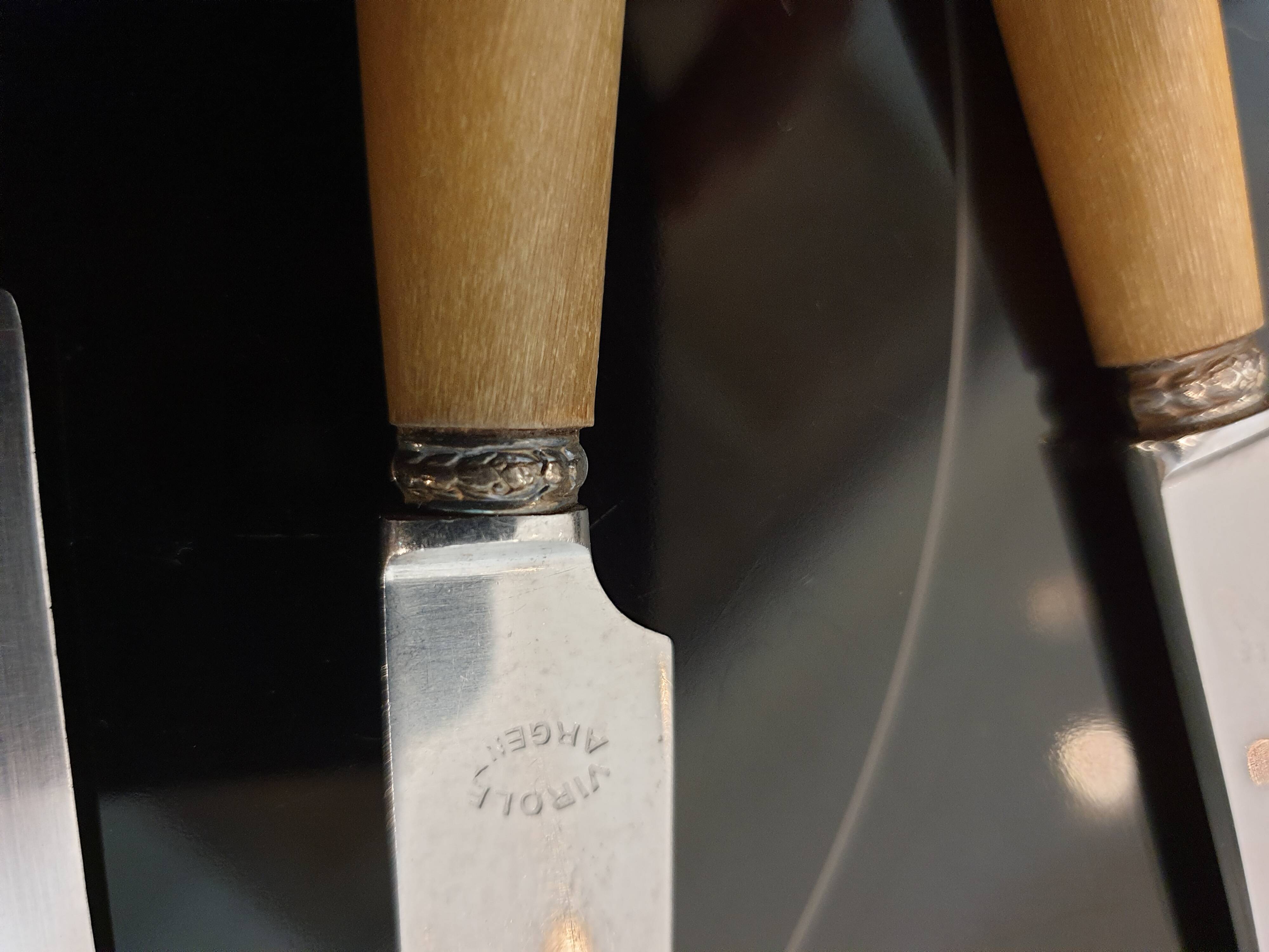 10 couteaux en corne virole en argent