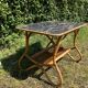 Table basse vintage en rotin et Formica