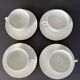 Set of 4 porcelain cups and sub-cups