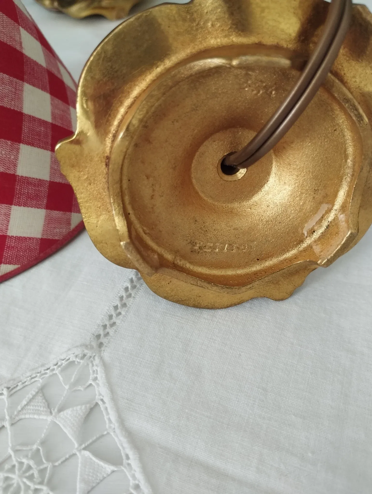 Pair of small lamps in gilded bronze by Petitot and red gingham lampshades.