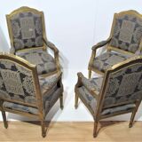 4 armchairs and a gilded wooden sofa Louis XVI style