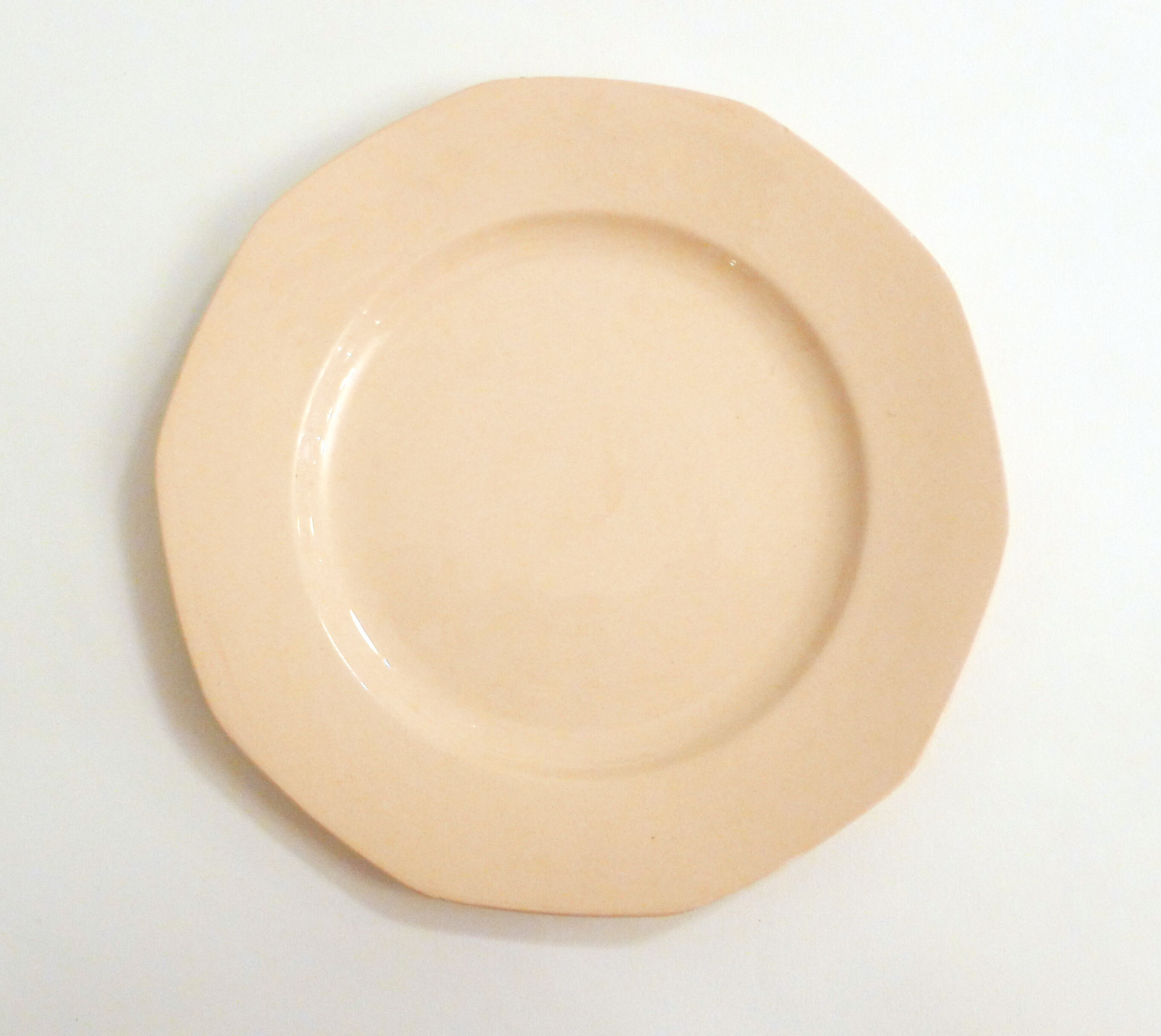 Set of 9 pink plates by Boch la Louvière