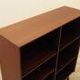 Danish mahogany veneered shelving unit on splayed legs, 1960s