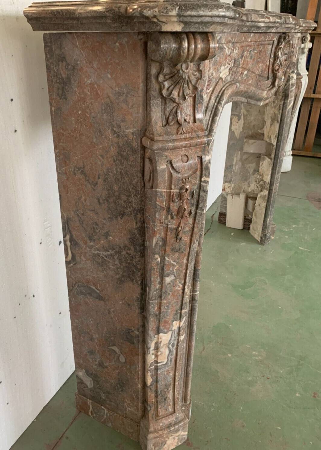 Louis XV style fireplace in red breche marble 19th century