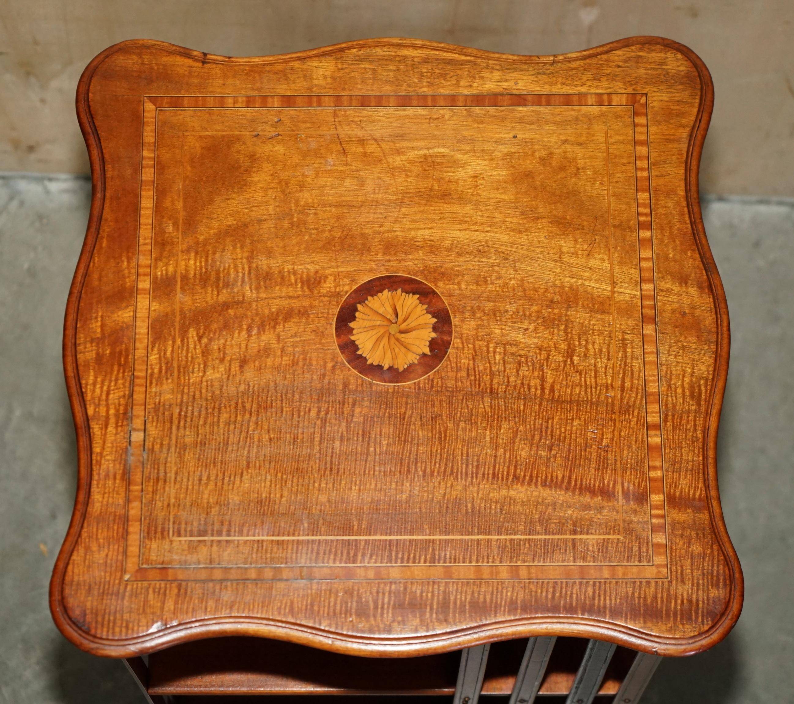 Sheraton-style rotating library table in walnut and satinwood.