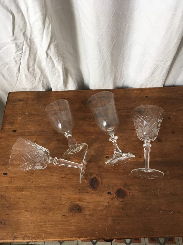 Four mismatched stemware