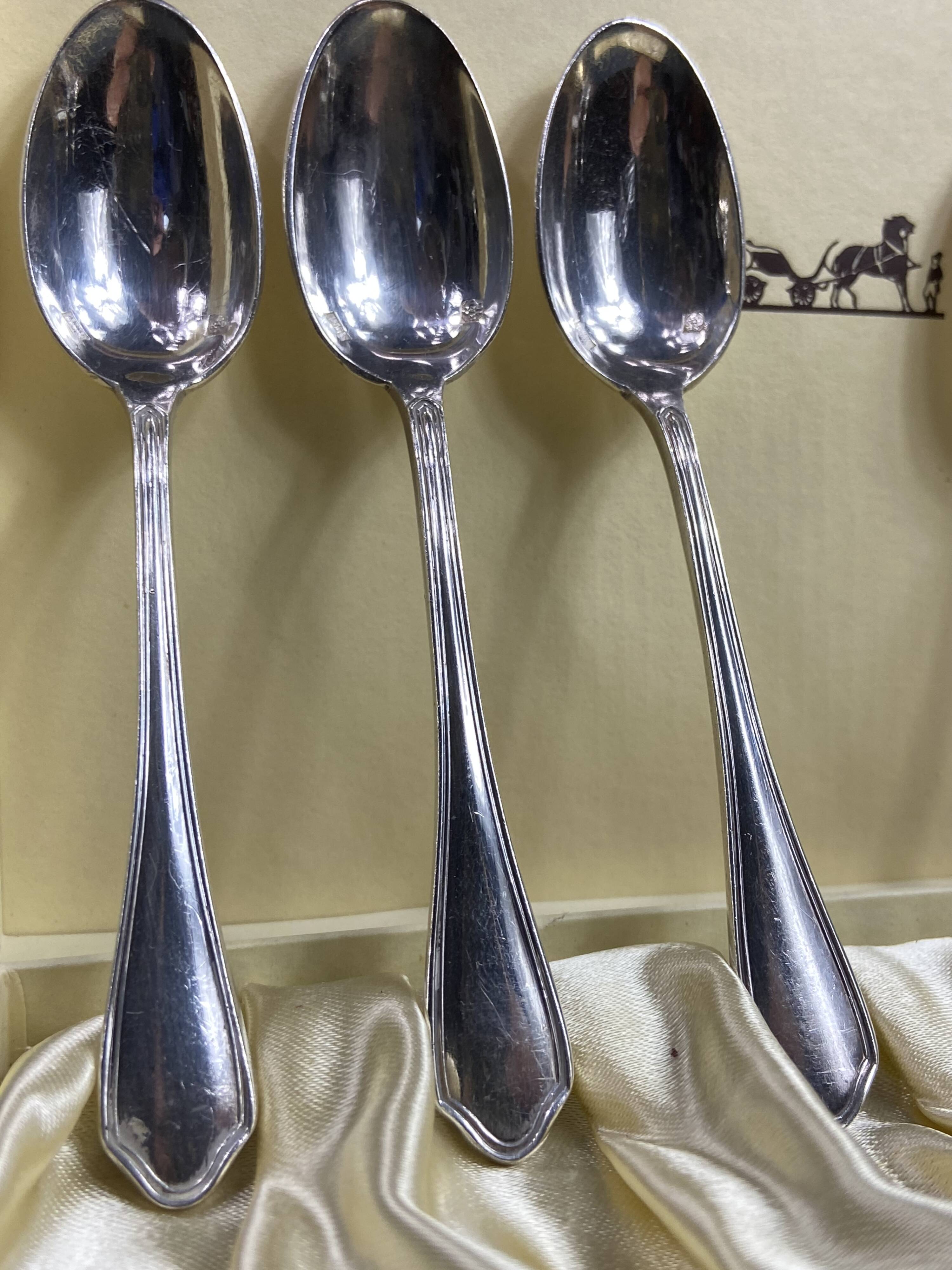 Complete set of 12 Louis XV style mocha spoons in silver-plated metal, Hermès