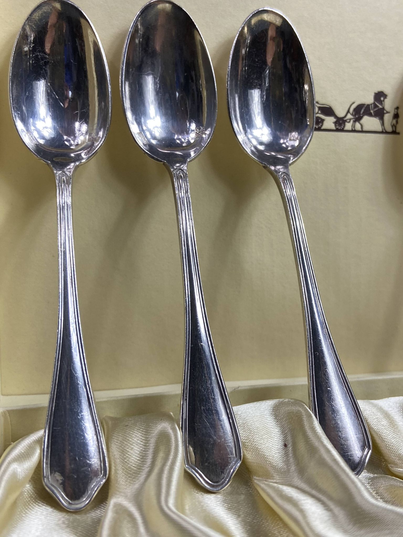 Complete set of 12 Louis XV style mocha spoons in silver-plated metal, Hermès