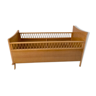 Vintage wooden baby cot and rattan strap