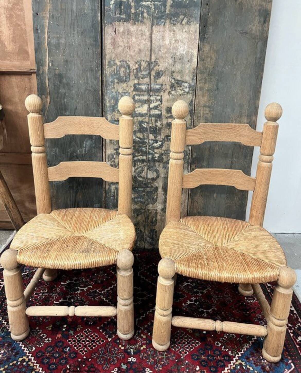 Pair of Dudouyt straw chairs