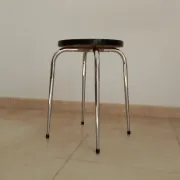 Vintage round stool in Formica from the 1970s.