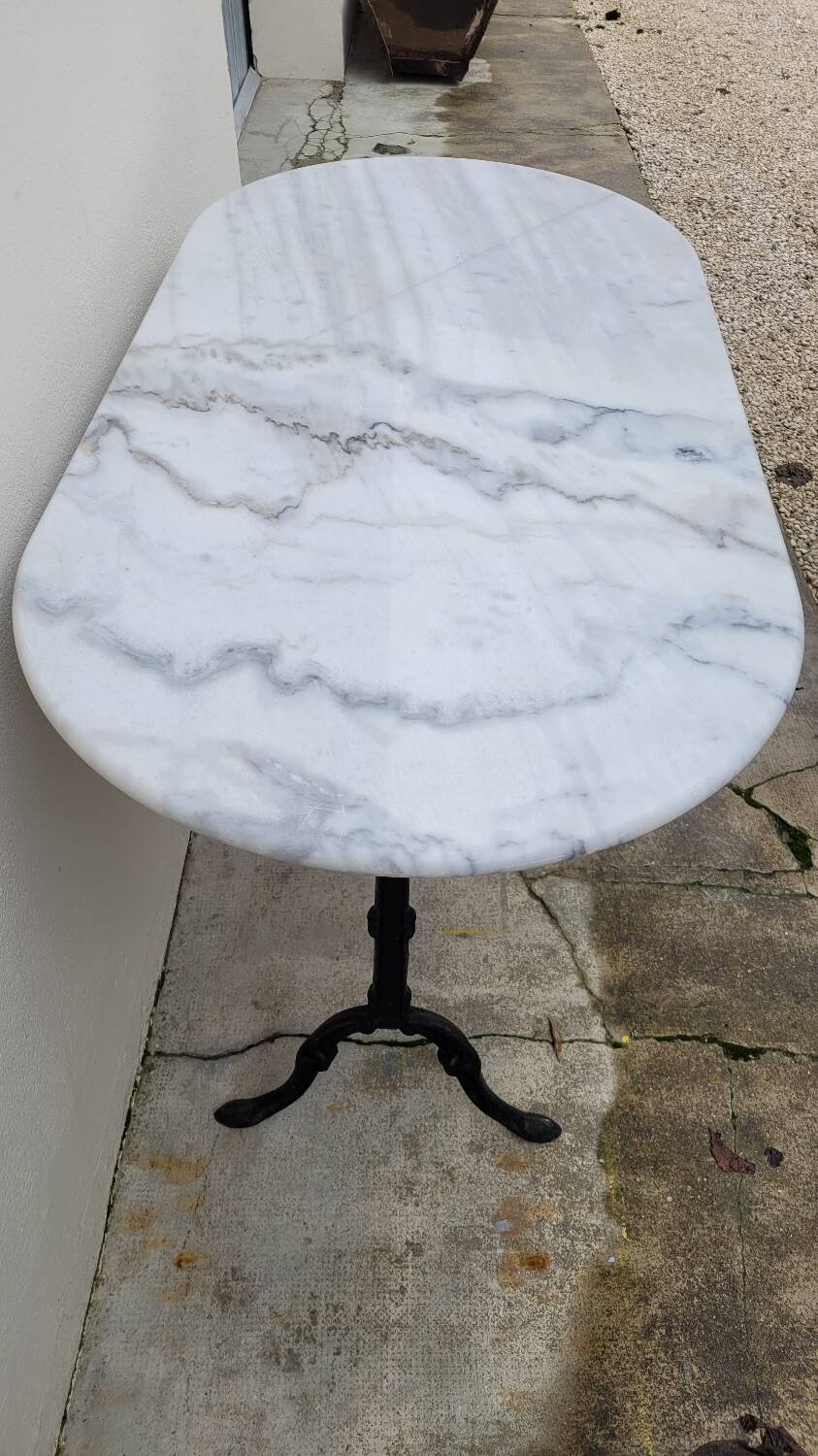 Antique cast iron bistro table with oval marble top