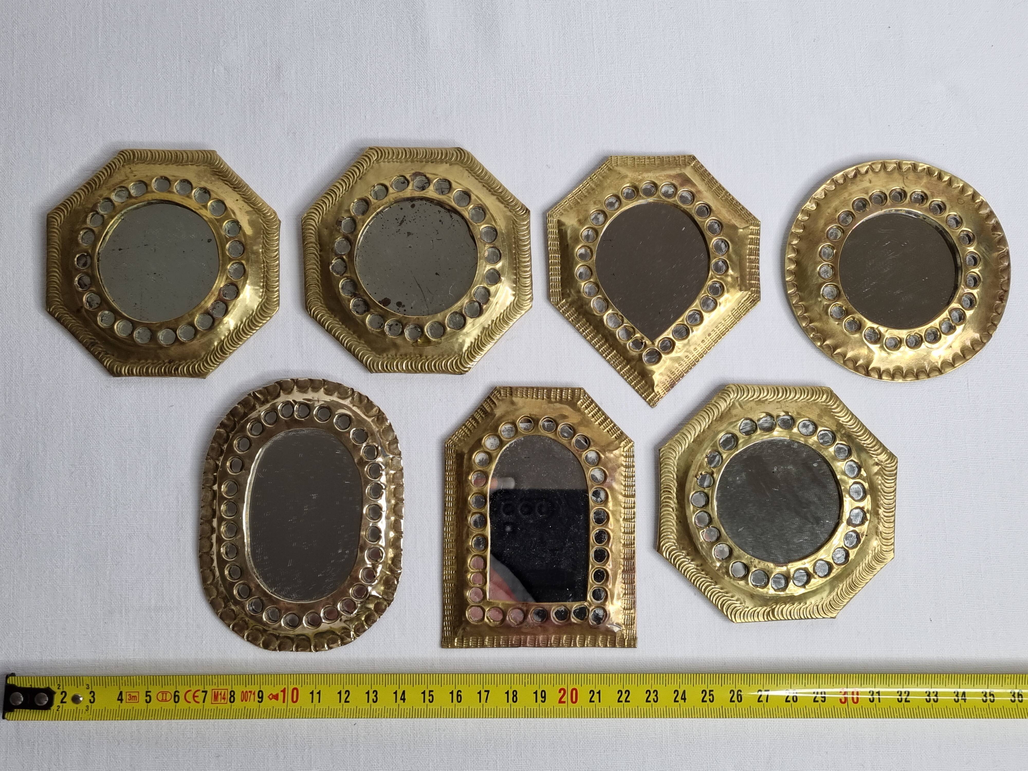 Set of 7 vintage Moroccan openwork brass mirrors