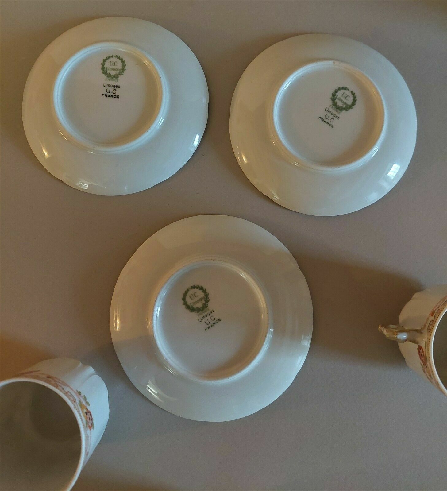 Porcelain cups UC Limoges, series of three