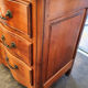 Crossbow chest of drawers with caramel patina