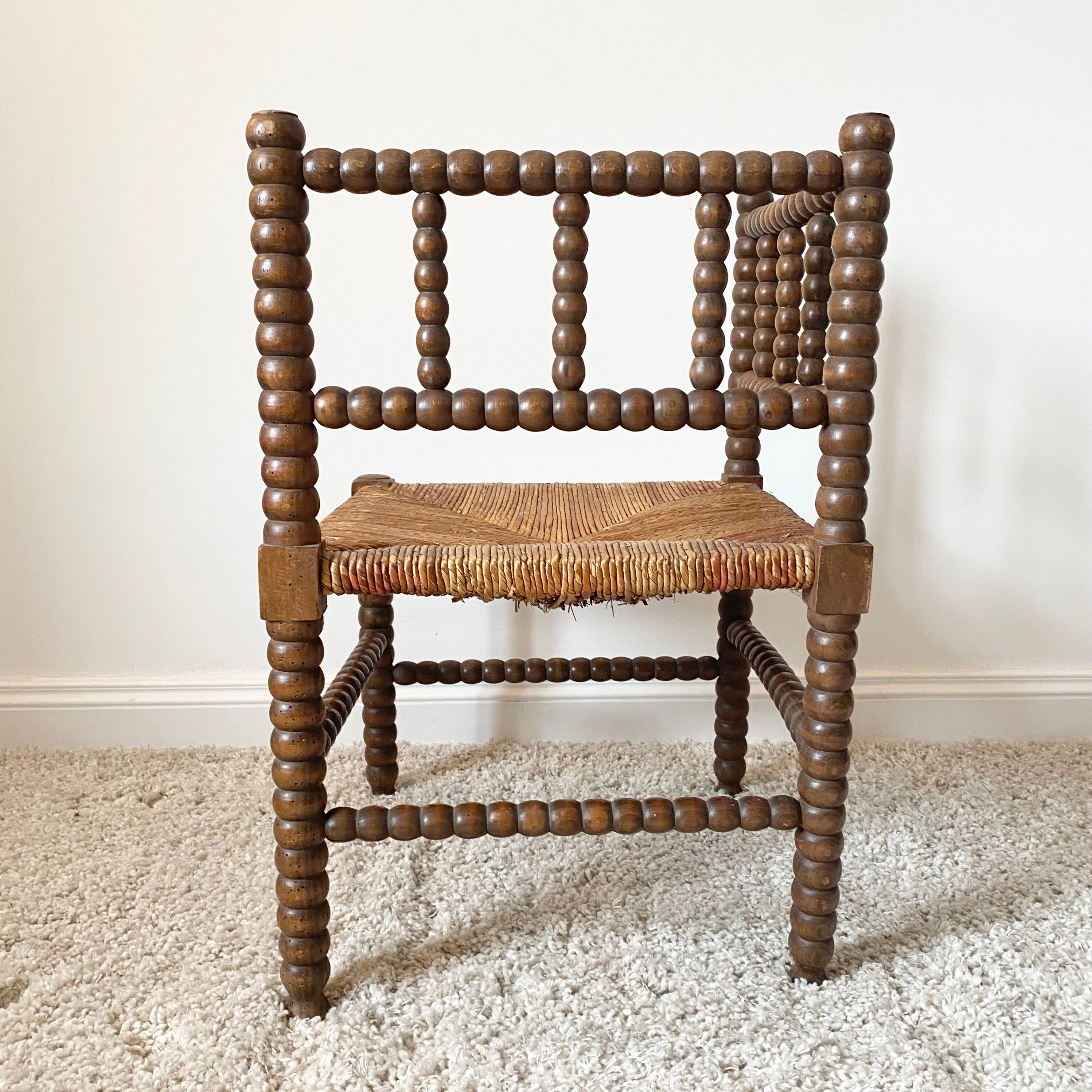Vintage corner chair in turned oak and straw