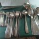 Silver metal cutlery. 12 spoons+12 forks+12 teaspoons+ladle. In box.