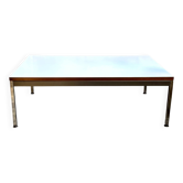 Table basse en mélaminé blanc et acier chromé