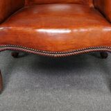 Old armchair in sheep leather