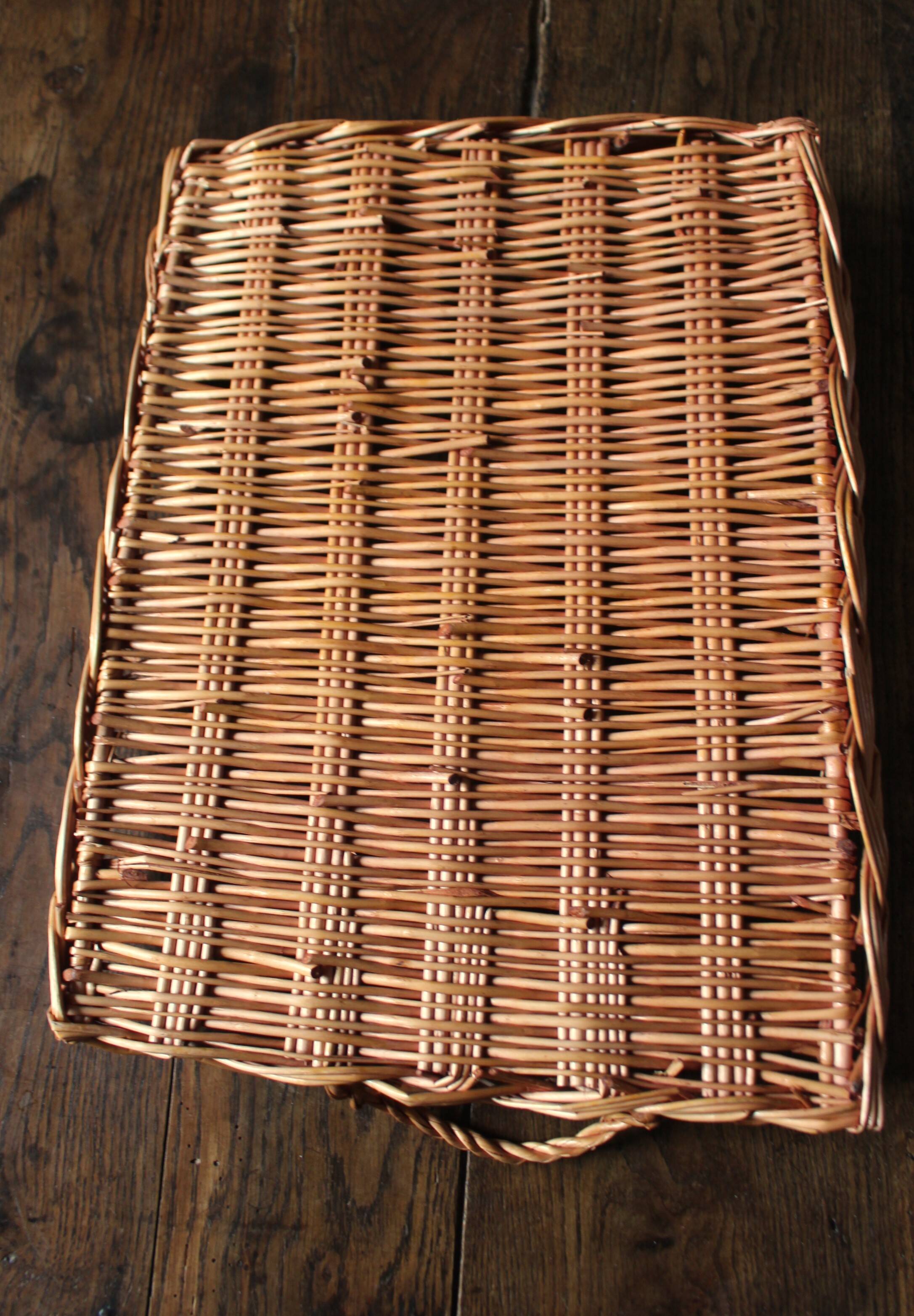 Large rectangular dark wicker tray with two vintage handles