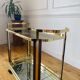 Gold metal dessert and smoked glass